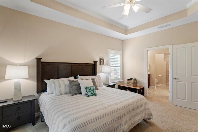 228 Ellisview Dr, Cary, NC 27519 - bedroom with crown molding, light carpet, a tray ceiling, and ceiling fan