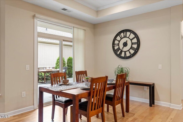228 Ellisview Dr, Cary, NC 27519 - dining space featuring light wood finished floors, ornamental molding, and baseboards