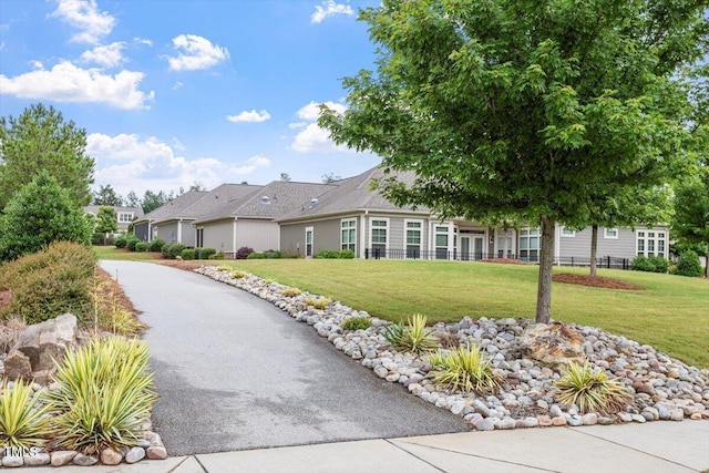 228 Ellisview Dr, Cary, NC 27519 - view of community with a yard
