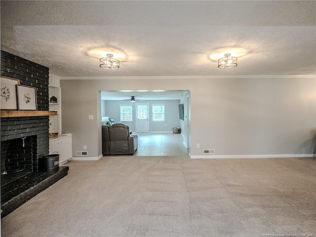5307 N Fayetteville Rd, Lumberton, NC 28360 - unfurnished living room featuring a textured ceiling, carpet floors, a ceiling fan, a fireplace, and baseboards