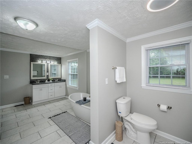 5307 N Fayetteville Rd, Lumberton, NC 28360 - full bath featuring a freestanding bath, vanity, healthy amount of natural light, baseboards, and ornamental molding