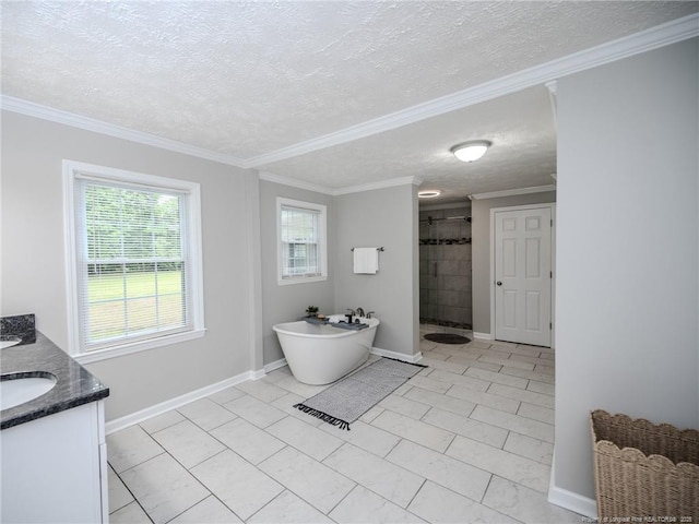 5307 N Fayetteville Rd, Lumberton, NC 28360 - full bath with vanity, a tile shower, a textured ceiling, ornamental molding, and a freestanding tub