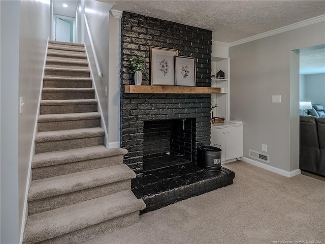 5307 N Fayetteville Rd, Lumberton, NC 28360 - unfurnished living room with stairs, a textured ceiling, crown molding, carpet, and a brick fireplace