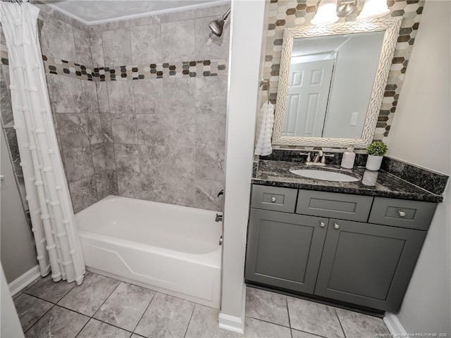 5307 N Fayetteville Rd, Lumberton, NC 28360 - bathroom featuring shower / tub combo with curtain, vanity, and baseboards