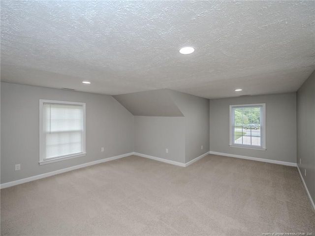 5307 N Fayetteville Rd, Lumberton, NC 28360 - bonus room with a textured ceiling, baseboards, light carpet, and recessed lighting