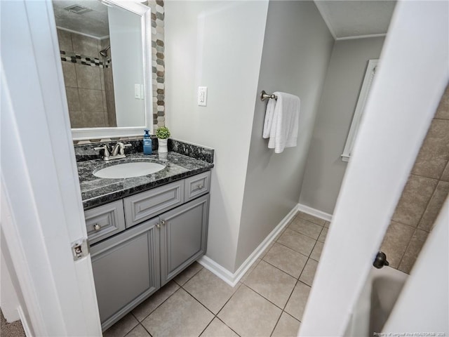 5307 N Fayetteville Rd, Lumberton, NC 28360 - full bathroom with vanity, tile patterned flooring, baseboards, and ornamental molding