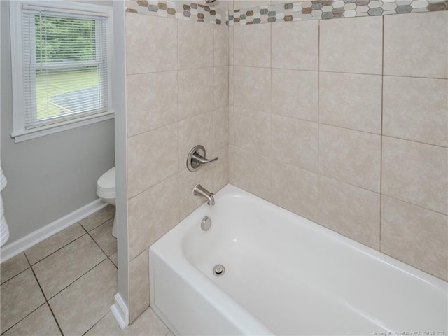 5307 N Fayetteville Rd, Lumberton, NC 28360 - bathroom with toilet, tile patterned flooring, baseboards, and shower / tub combination