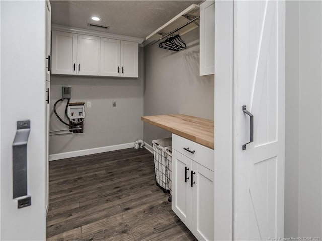 5307 N Fayetteville Rd, Lumberton, NC 28360 - laundry room featuring baseboards, electric dryer hookup, cabinet space, dark wood finished floors, and recessed lighting