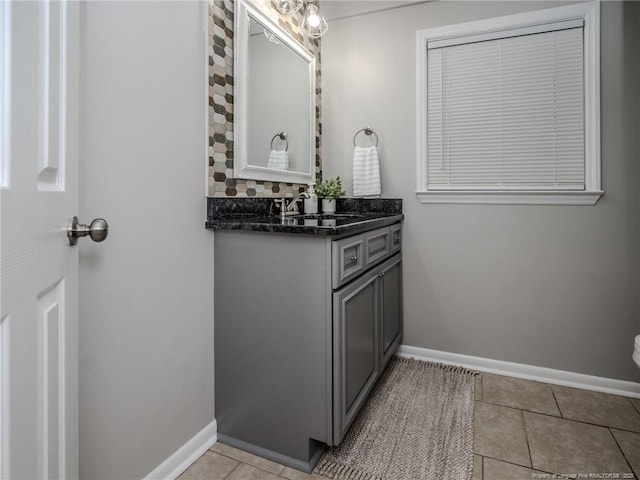 5307 N Fayetteville Rd, Lumberton, NC 28360 - bathroom featuring vanity, baseboards, tile patterned floors, and toilet