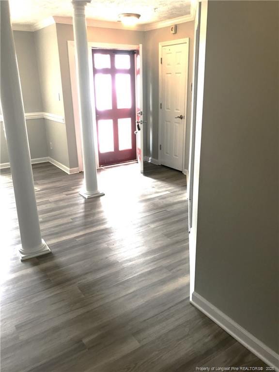 330 Bubble Creek Ct Unit 8, Fayetteville, NC 28311 - entryway featuring ornamental molding, decorative columns, baseboards, and dark wood-type flooring