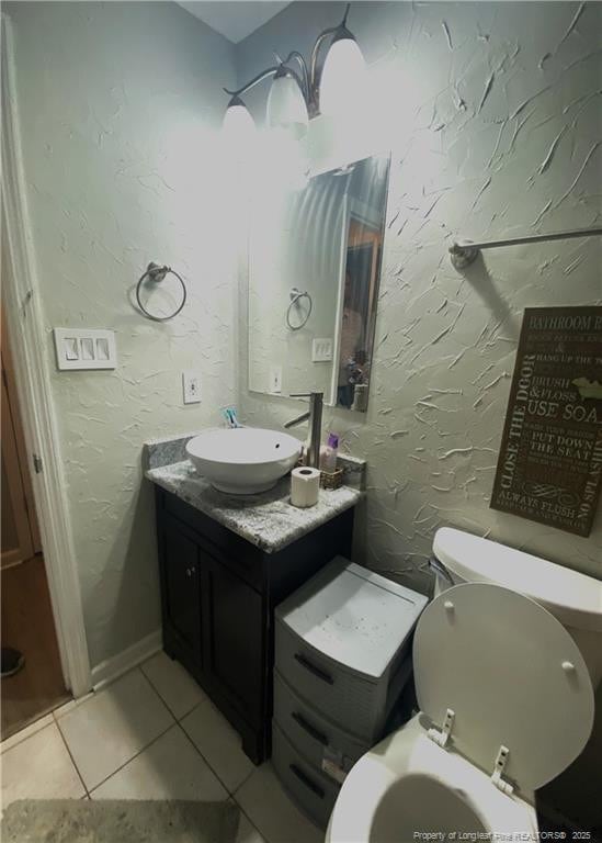 330 Bubble Creek Ct Unit 8, Fayetteville, NC 28311 - half bathroom featuring tile patterned flooring, vanity, and toilet