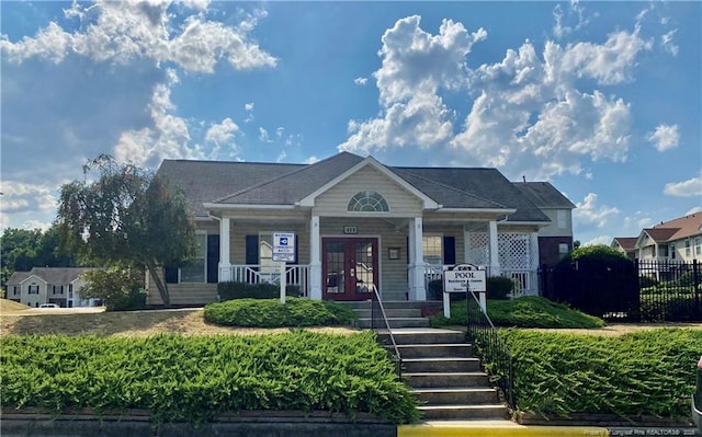 330 Bubble Creek Ct Unit 8, Fayetteville, NC 28311 - view of front of house with covered porch, french doors, and stairway