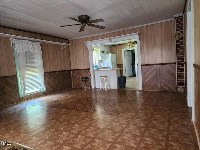 111 Matthews Mill Pond Rd, Angier, NC 27501 - unfurnished room featuring wooden walls and ceiling fan
