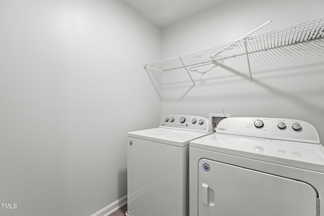 1102 Latitude Dr, Durham, NC 27713 - laundry room featuring washer and clothes dryer and baseboards