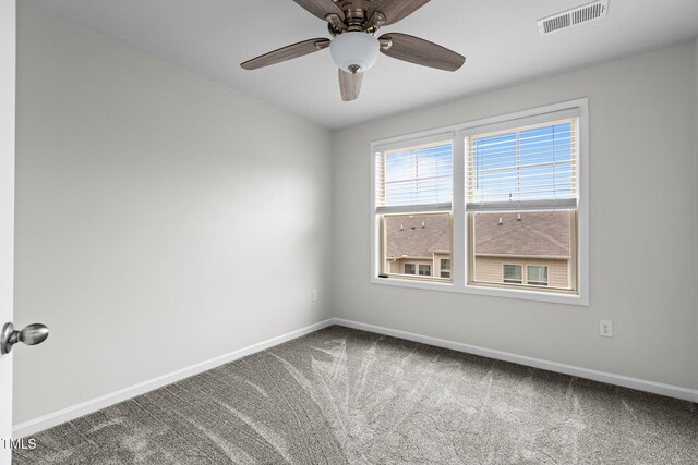 1102 Latitude Dr, Durham, NC 27713 - carpeted spare room with baseboards and a ceiling fan