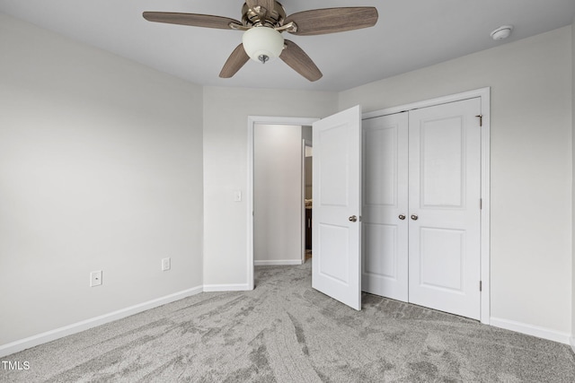 1102 Latitude Dr, Durham, NC 27713 - unfurnished bedroom featuring carpet floors, baseboards, a closet, and a ceiling fan