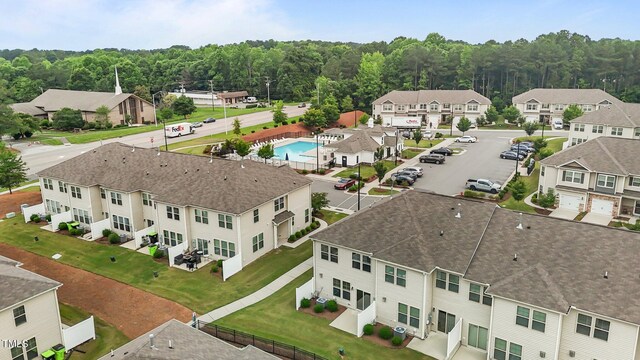 1102 Latitude Dr, Durham, NC 27713 - drone / aerial view of a forest and a pool
