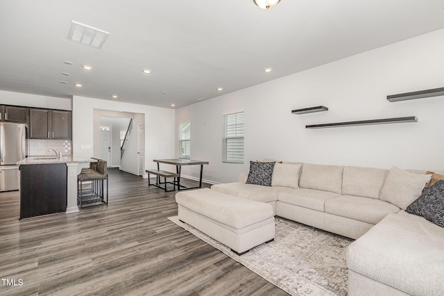 1725 Winter Jasmine Ln, Wake Forest, NC 27587 - living room with wood finished floors, recessed lighting, and baseboards