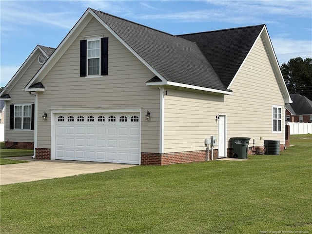 135 Paulownia Dr, Saint Pauls, NC 28384 - view of property exterior featuring a lawn, central AC unit, driveway, and a shingled roof