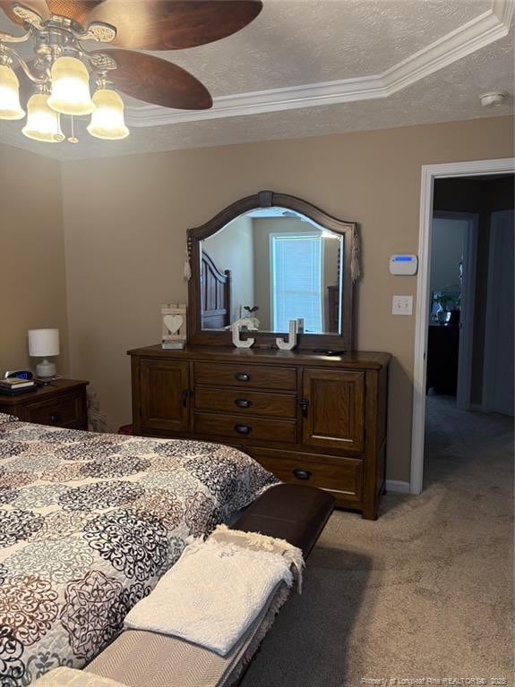 135 Paulownia Dr, Saint Pauls, NC 28384 - bedroom featuring light colored carpet, crown molding, ceiling fan, and a raised ceiling
