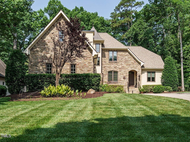 410 Mountain Laurel, Chapel Hill, NC 27517 - view of front of property featuring a front yard, stone siding, and stucco siding