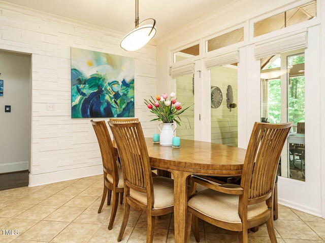 410 Mountain Laurel, Chapel Hill, NC 27517 - dining space featuring ornamental molding, light tile patterned floors, and brick wall