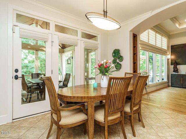 410 Mountain Laurel, Chapel Hill, NC 27517 - dining area featuring ornamental molding, plenty of natural light, light tile patterned flooring, and arched walkways