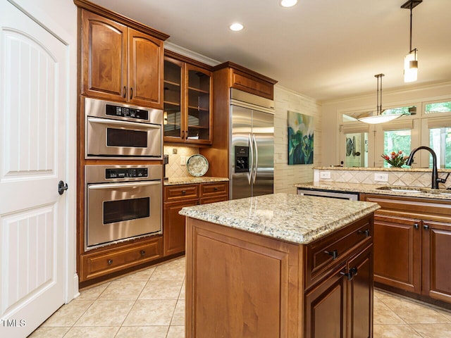 410 Mountain Laurel, Chapel Hill, NC 27517 - kitchen featuring appliances with stainless steel finishes, a sink, backsplash, a center island, and recessed lighting