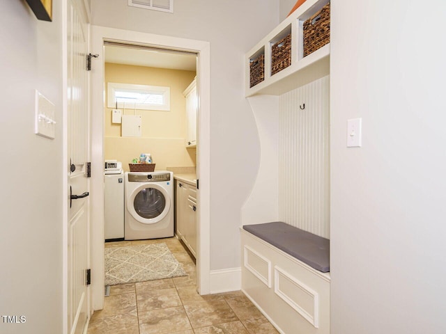 410 Mountain Laurel, Chapel Hill, NC 27517 - laundry area featuring cabinet space, washer and dryer, and light tile patterned floors