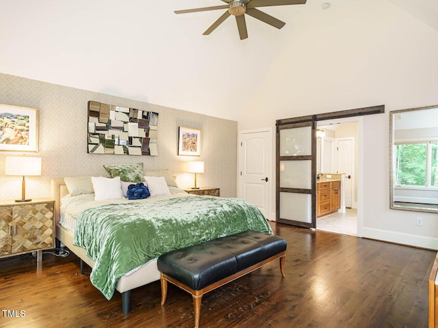 410 Mountain Laurel, Chapel Hill, NC 27517 - bedroom with wallpapered walls, baseboards, wood finished floors, a barn door, and high vaulted ceiling