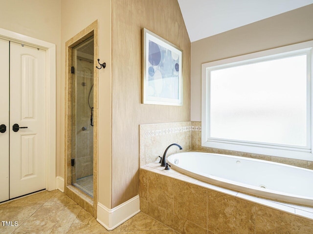 410 Mountain Laurel, Chapel Hill, NC 27517 - full bath featuring a bath, a shower stall, lofted ceiling, and tile patterned flooring