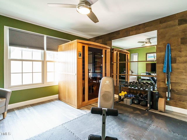 410 Mountain Laurel, Chapel Hill, NC 27517 - exercise room featuring a ceiling fan, wood walls, and baseboards