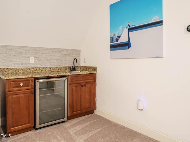 410 Mountain Laurel, Chapel Hill, NC 27517 - indoor wet bar with wine cooler, light carpet, baseboards, and backsplash