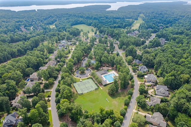 410 Mountain Laurel, Chapel Hill, NC 27517 - aerial overview of property's location featuring a heavily wooded area, a nearby body of water, and nearby suburban area