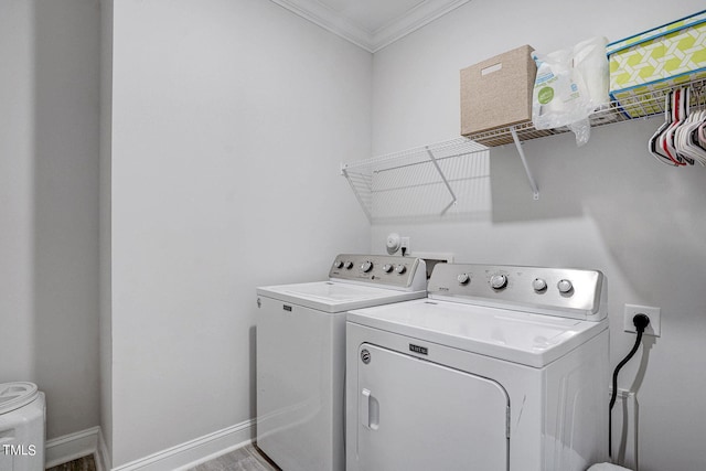 244 Chateau Way, Angier, NC 27501 - washroom with washer and clothes dryer and ornamental molding
