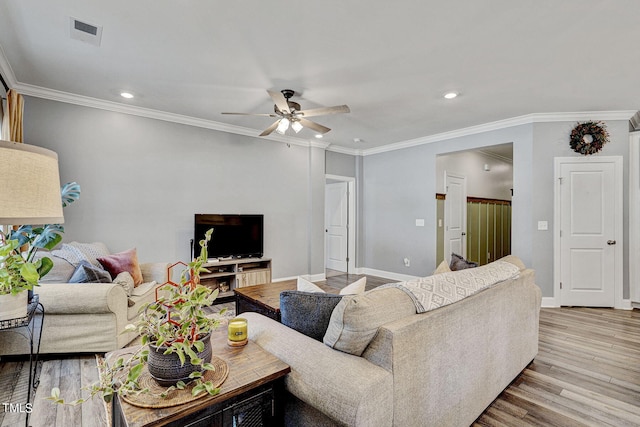 244 Chateau Way, Angier, NC 27501 - living room featuring light wood-type flooring, a ceiling fan, recessed lighting, and crown molding