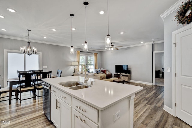 244 Chateau Way, Angier, NC 27501 - kitchen with recessed lighting, light wood finished floors, light countertops, a ceiling fan, and hanging light fixtures