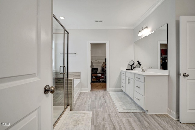 244 Chateau Way, Angier, NC 27501 - full bathroom with a walk in closet, vanity, a stall shower, ornamental molding, and a bath
