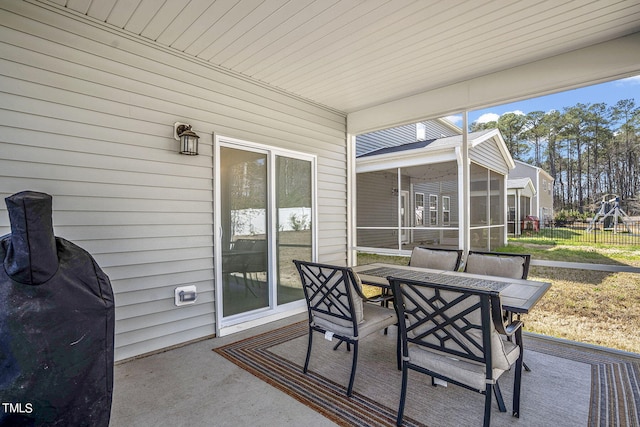 244 Chateau Way, Angier, NC 27501 - sunroom with outdoor dining space