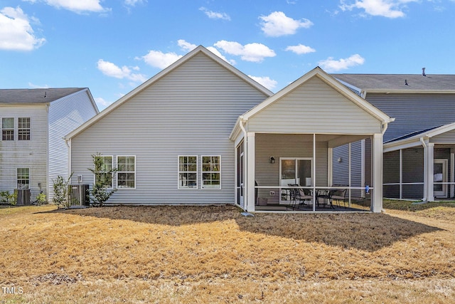 244 Chateau Way, Angier, NC 27501 - rear view of house featuring a sunroom