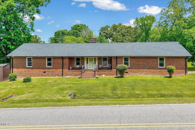 750 Greenleaf Rd, Angier, NC 27501 - ranch-style home featuring a chimney, covered porch, brick siding, and a front lawn