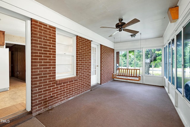 2016 Tryon Rd, Raleigh, NC 27603 - unfurnished sunroom with ceiling fan
