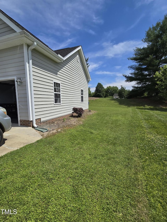 5810 Stardust Ct, Durham, NC 27712 - view of side of property with a yard
