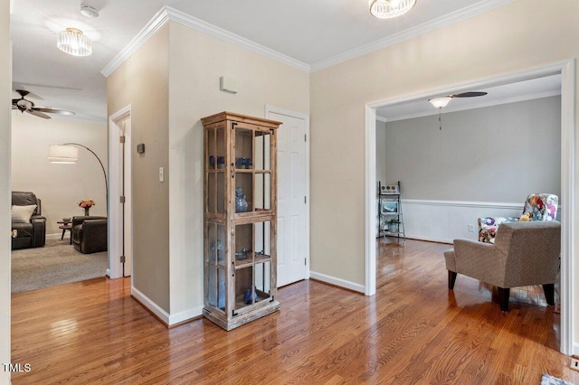 4329 Hawksong Pl, Cary, NC 27518 - corridor featuring wood finished floors, crown molding, and baseboards