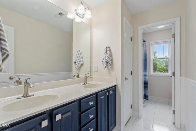 4329 Hawksong Pl, Cary, NC 27518 - full bath with double vanity and tile patterned flooring