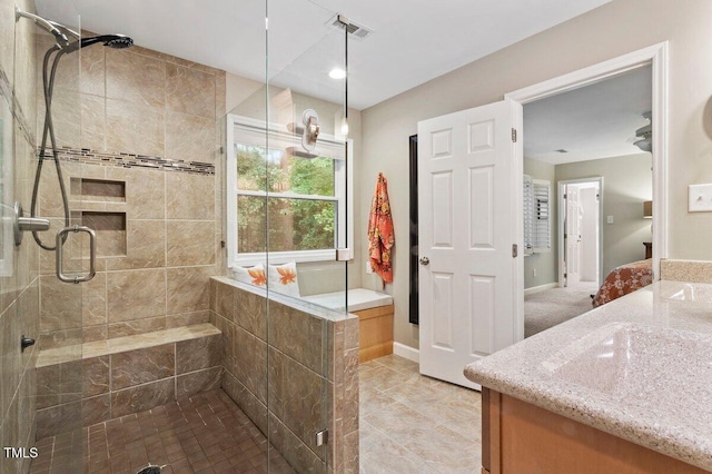 4329 Hawksong Pl, Cary, NC 27518 - full bathroom featuring vanity, a shower stall, tile patterned flooring, and baseboards