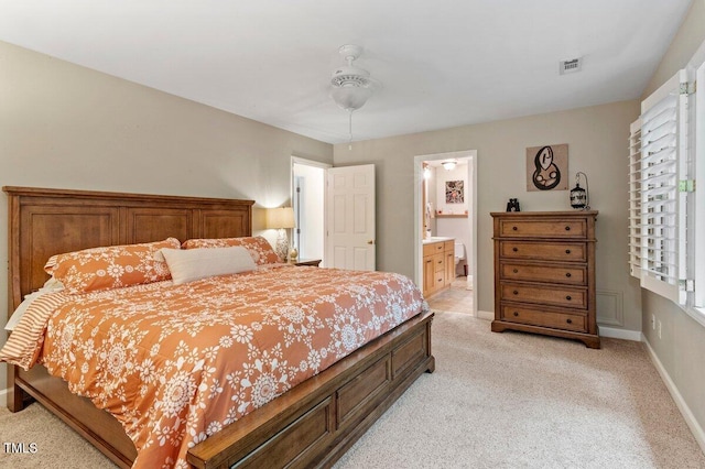 4329 Hawksong Pl, Cary, NC 27518 - bedroom featuring light carpet, baseboards, and ensuite bath