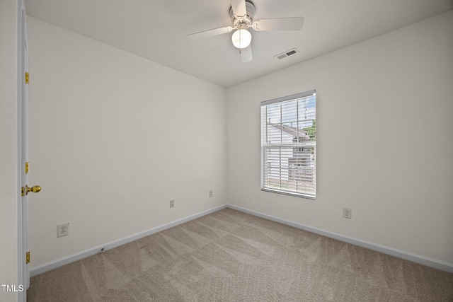 8151 Rhiannon Rd, Raleigh, NC 27613 - spare room featuring light carpet and ceiling fan