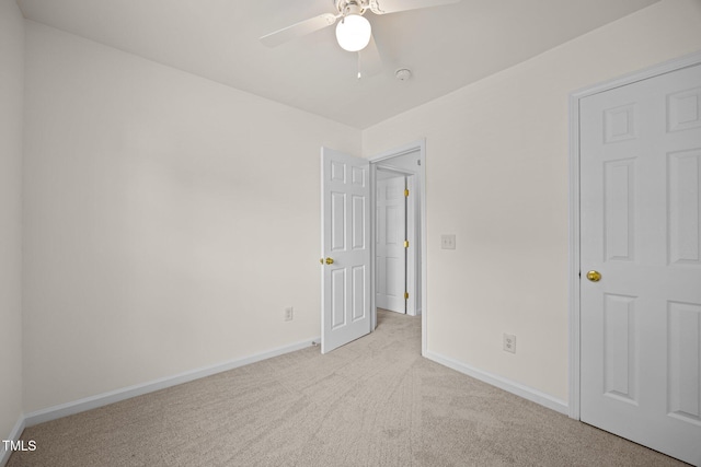 8151 Rhiannon Rd, Raleigh, NC 27613 - unfurnished bedroom with light colored carpet and ceiling fan