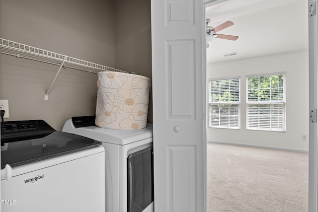 8151 Rhiannon Rd, Raleigh, NC 27613 - laundry room featuring washing machine and dryer, ceiling fan, and carpet floors